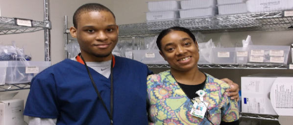 A Project SEARCH Intern working the hospital