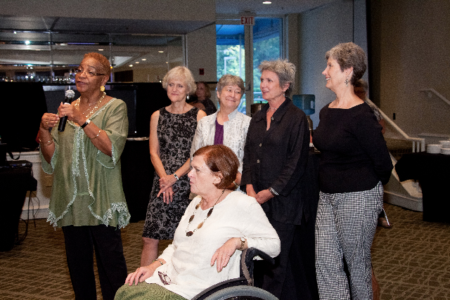 The Directors giving a speech for Dottie Adams at the MAD Annual Ceremony