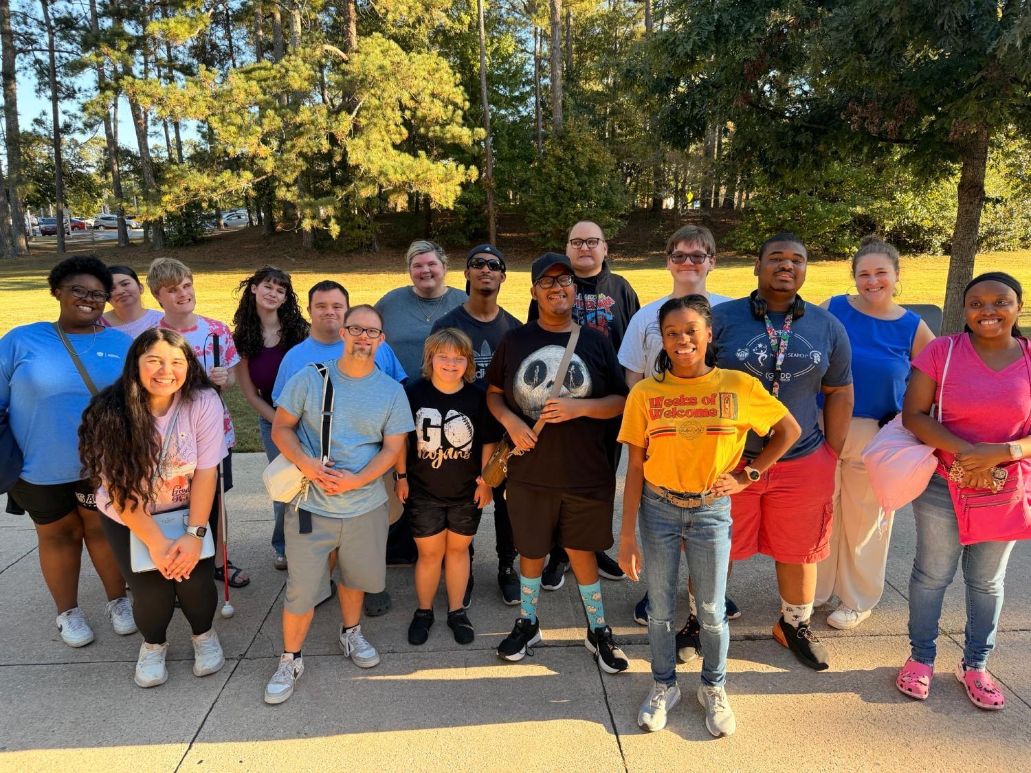 Group of people smiling outside