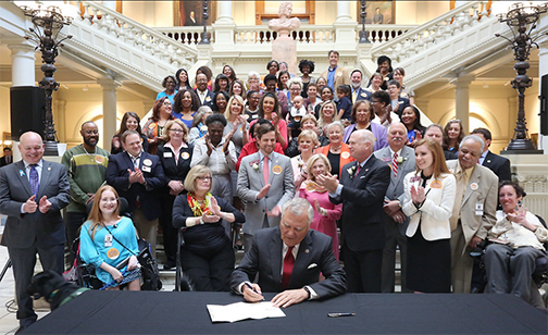 Governor Deals signs the Family Care Act