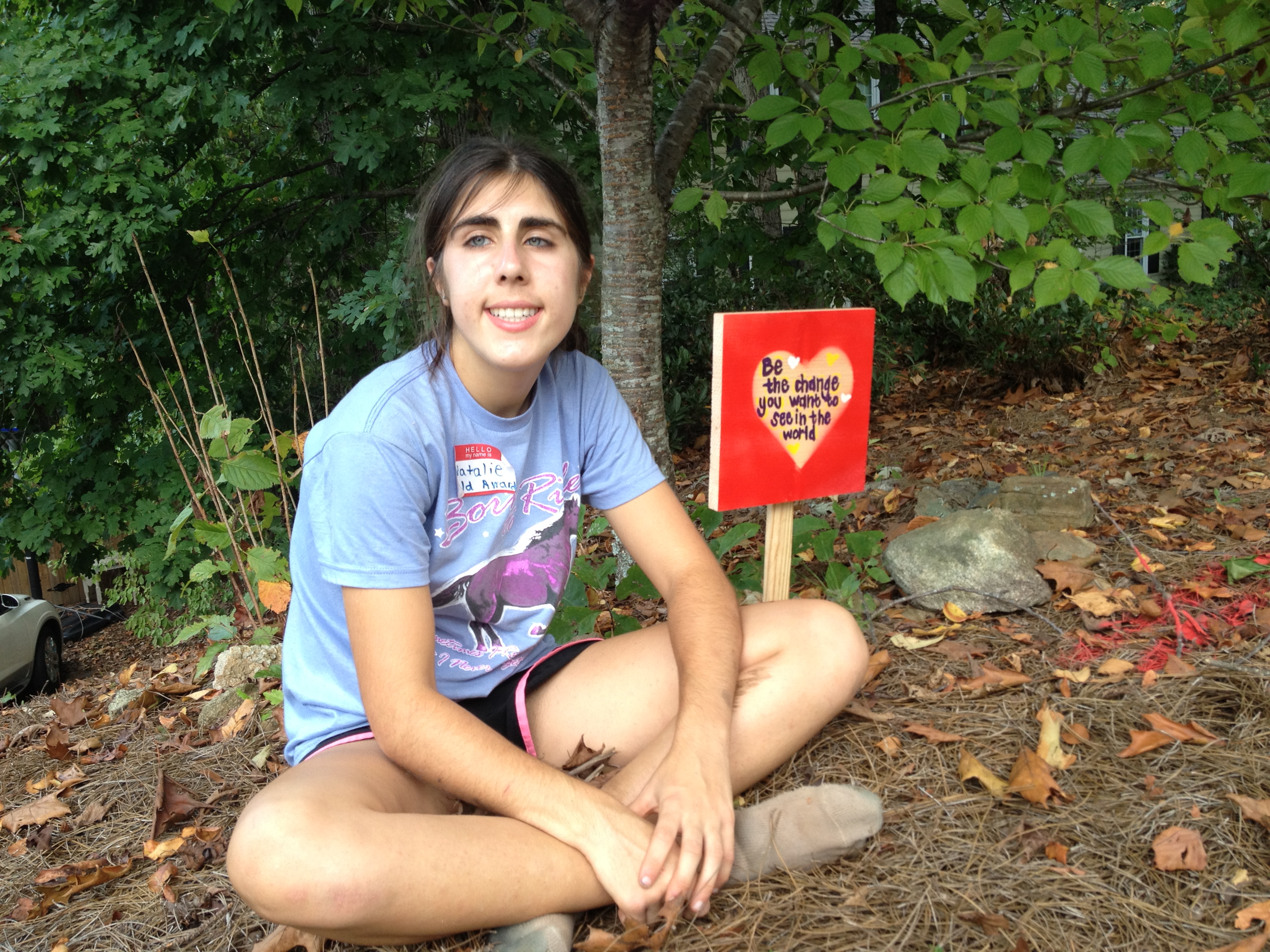 Natalie Anderson with The Milton Love Project sign