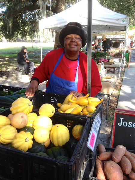  Helen Fields of Joseph Fields Farm has a welcome smile for everyone who visits her display of organic produce at Forsyth Farmers' Market.      Helen Fields of Joseph Fields Farm has a welcome smile for everyone who visits her display of organic produce at Forsyth Farmers' Market.