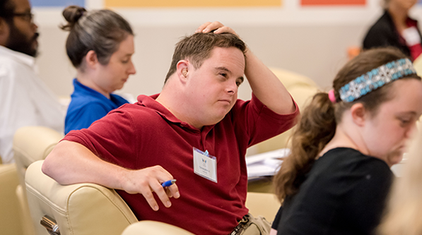 Man with disabilities at employment conference